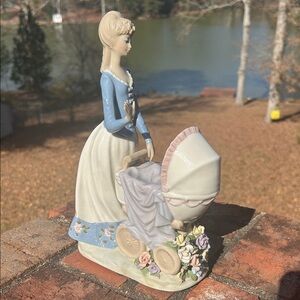 Lladro Porcelain Figurine in Blue and Cream with Floral Accents